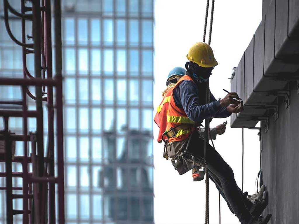 A construction worker working in a building